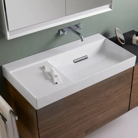 GEBERIT ONE lavabo sortie horizontale, surface de rangement à gauche